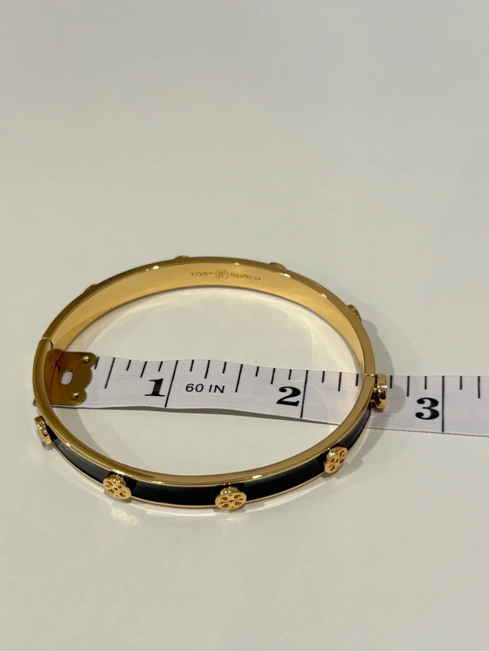 Tory Burch Black Enamel Bangle with Gold Logo Discs